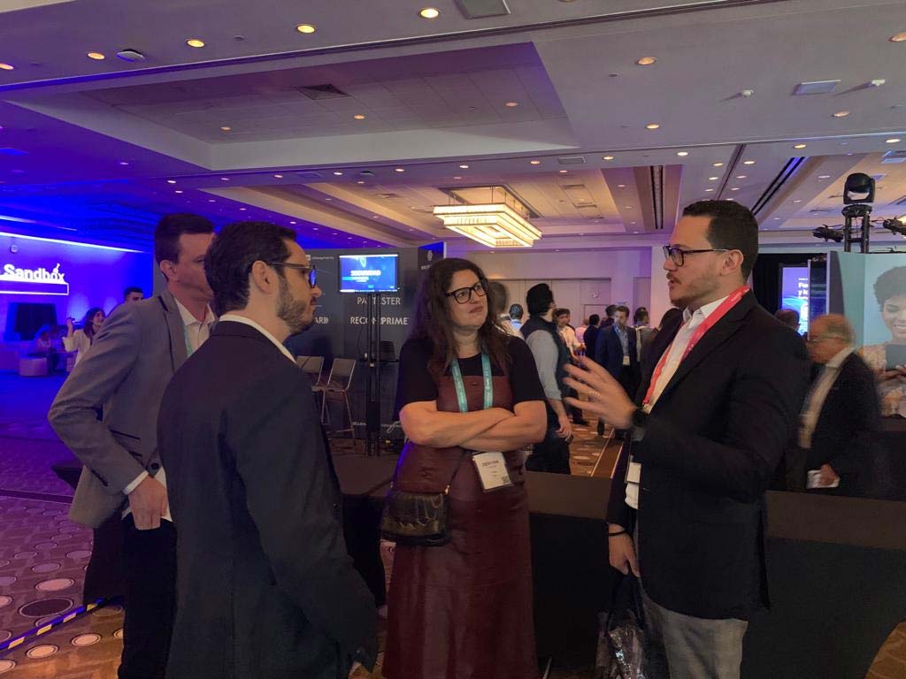 CEO and co-founder Ricardo Josua welcoming people at Fintech Americas 2022 Pismo booth
